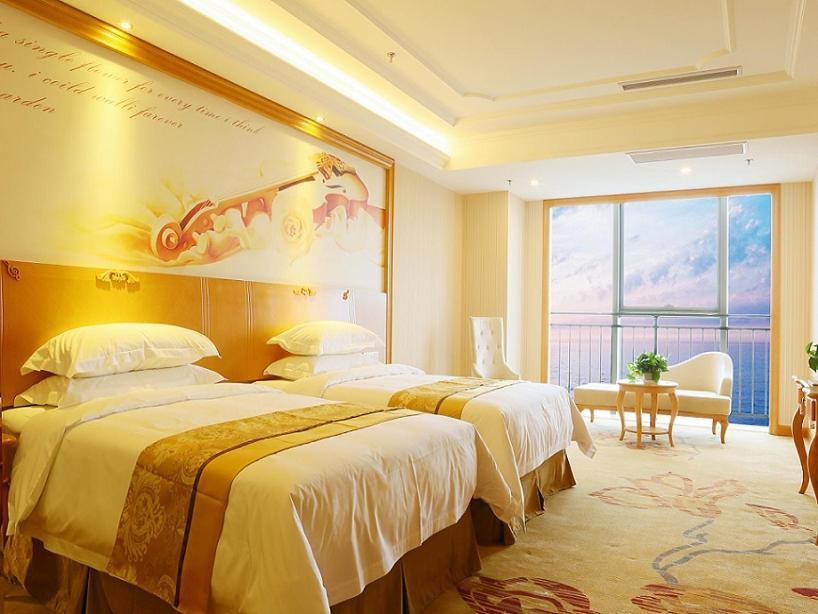 Vienna International Hotel Yantai Changjiang Road Xingyi Square Branch Zewnętrze zdjęcie